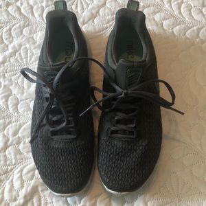 Women’s Nike Renew tennis shoes